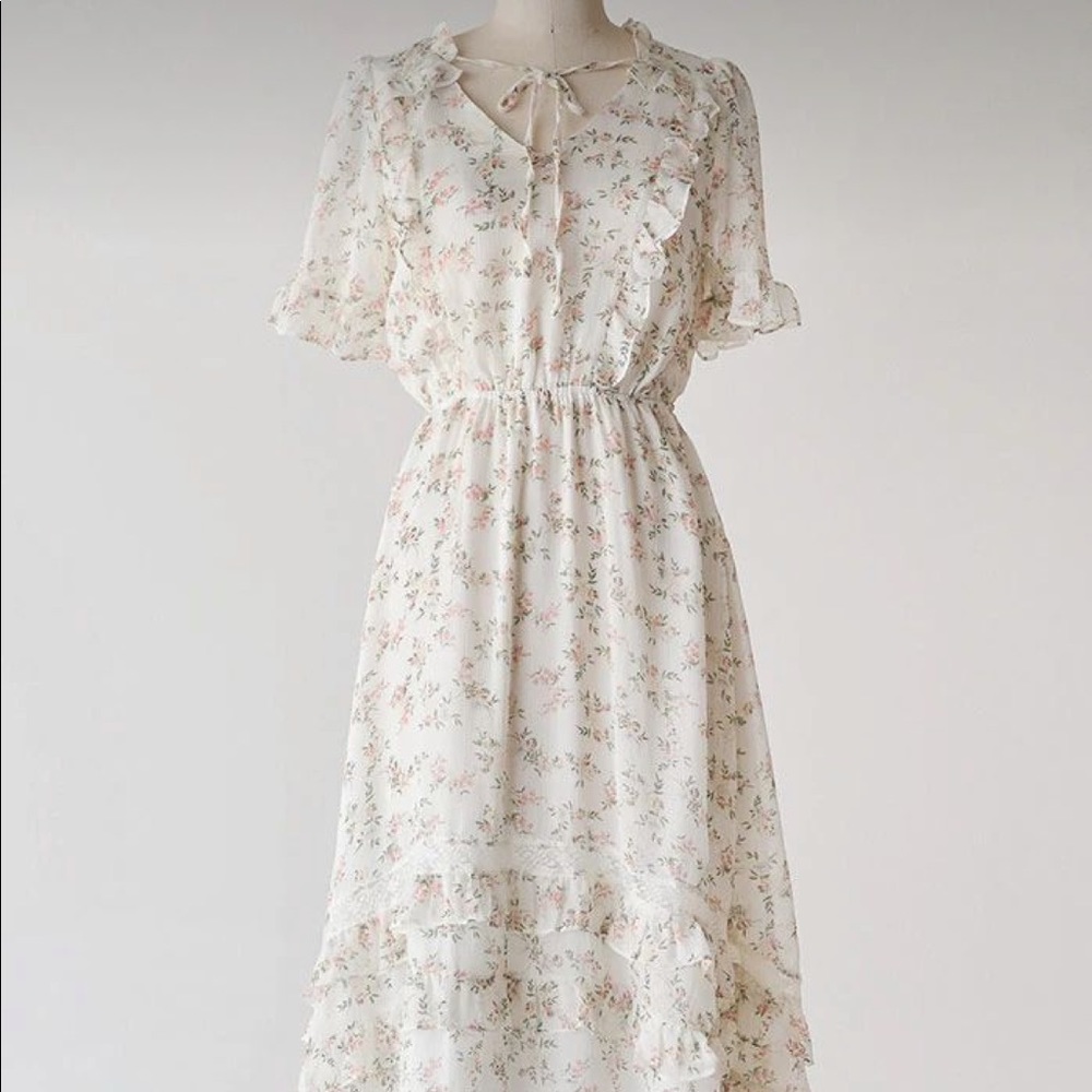 Sweet creamy and pink floral ruffle dress.